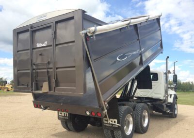 One of our silage truck bodies in black.