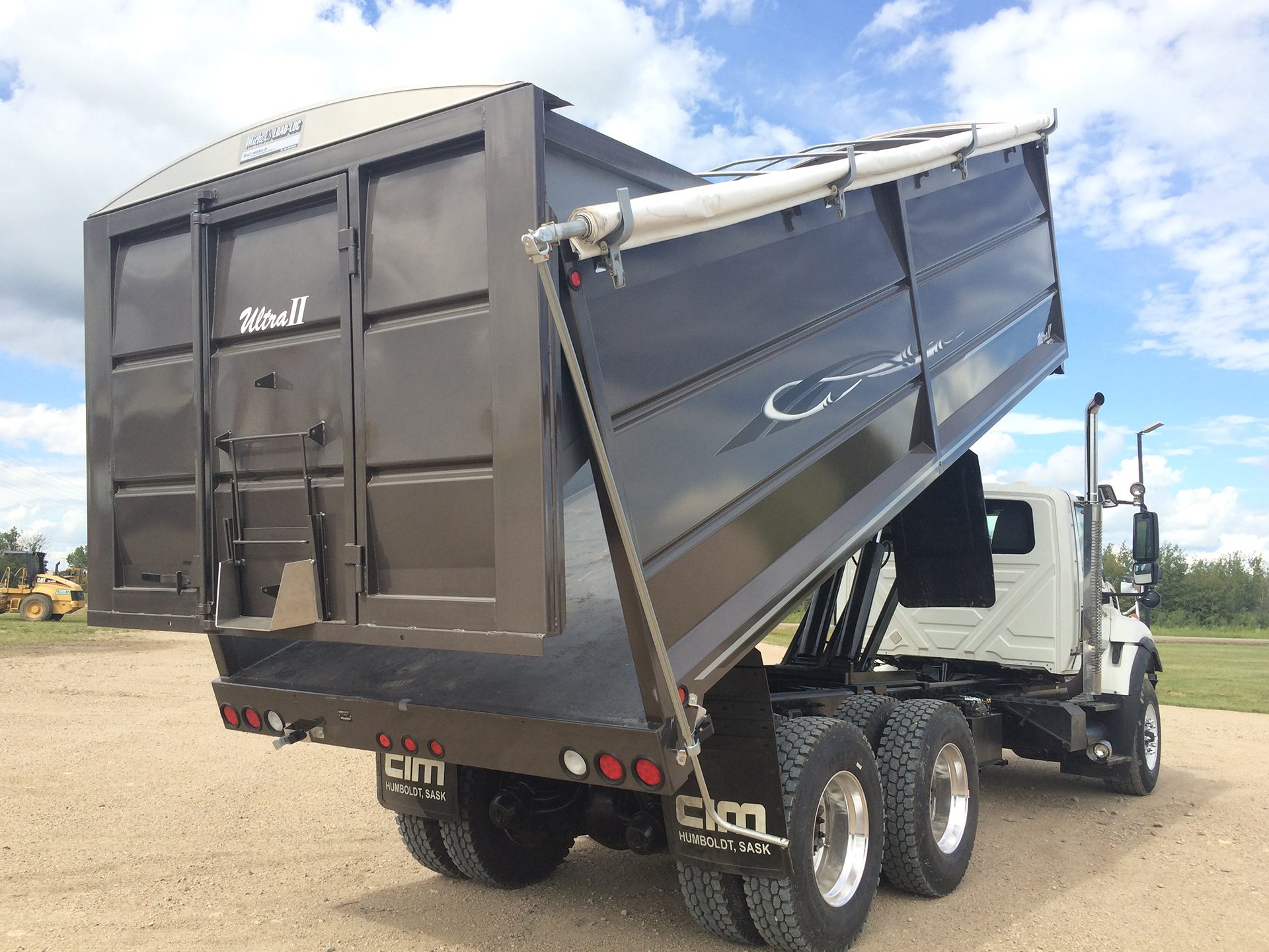 An agricultural truck body fully extended off the truck.